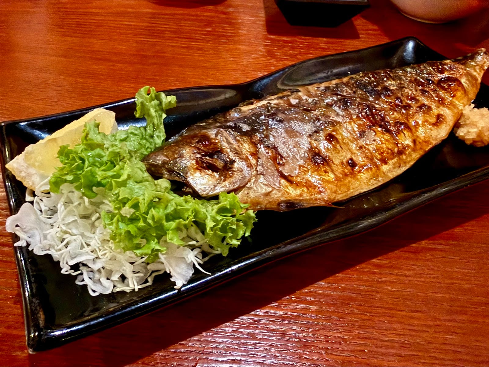Whole salt-grilled aji fish at Hanabi Robata Izakaya Kulai