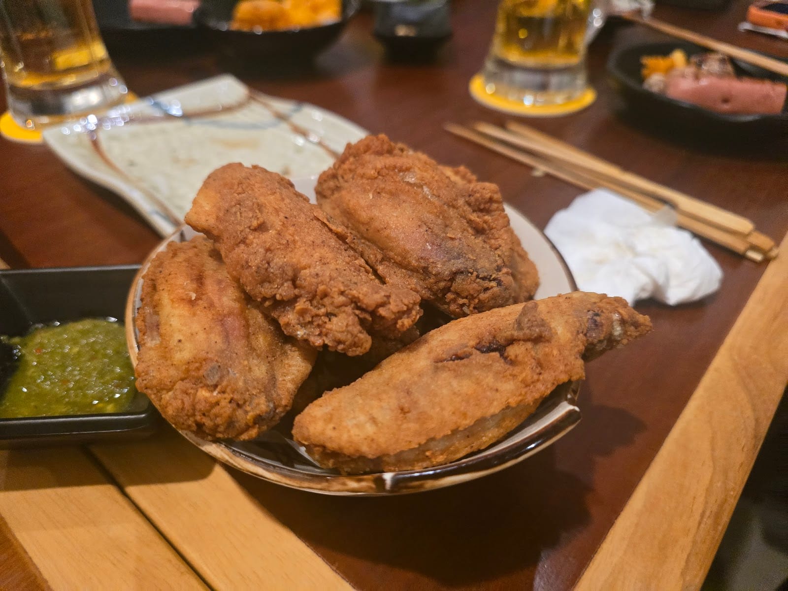 Karaage fried chicken with draft beer at Hanabi Robata Izakaya Mount Austin